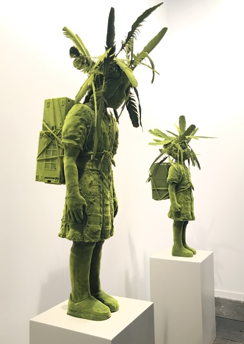 Kim Simonsson. Mossgirl and mossboy with birdhouse (Ceramics, Nylonfibre, feathers).