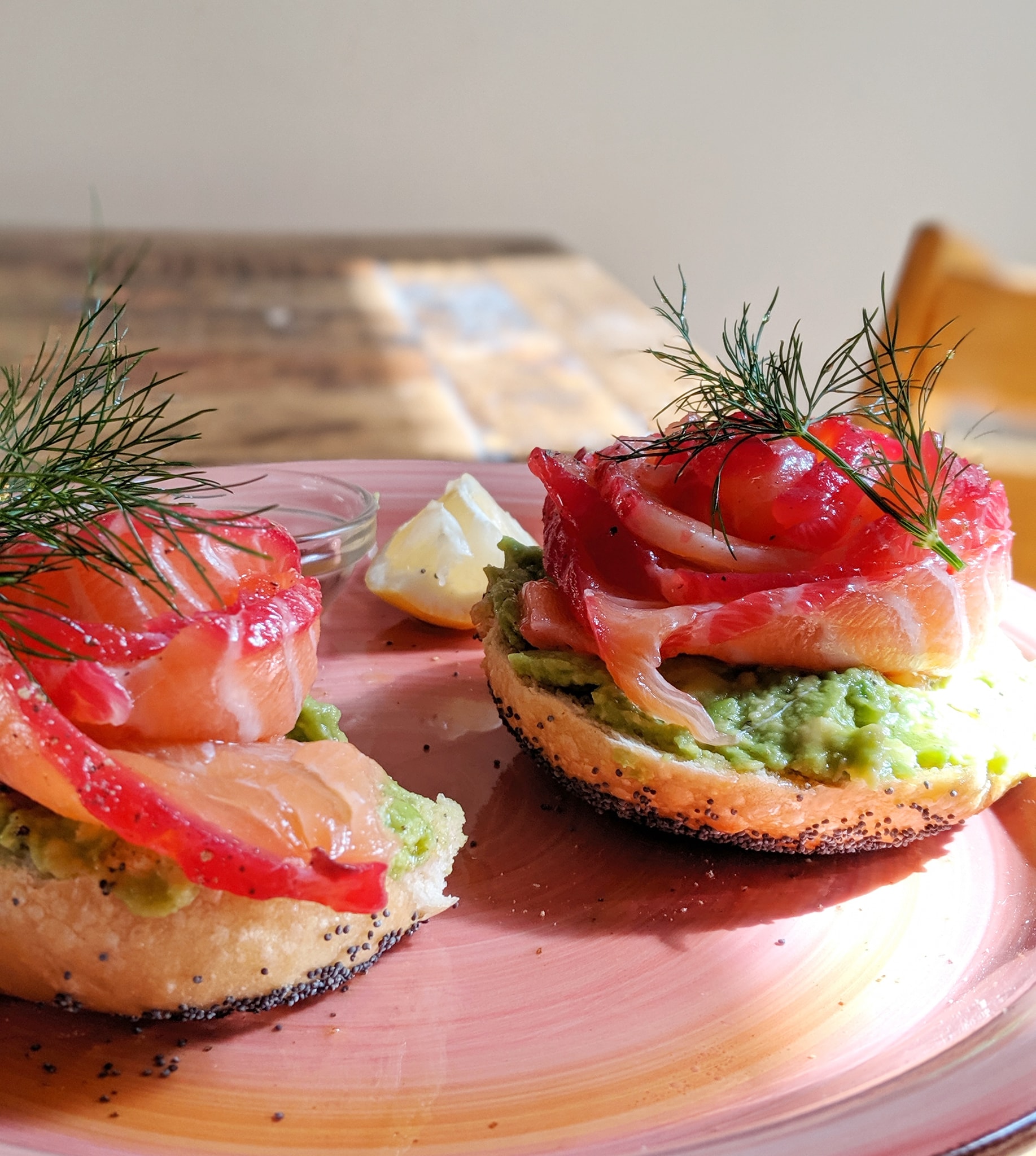 An oldie but goodie at Allan's: Poppy seed bagel with homecured salmon, smash avocado, Dill and squeeze of lemon. | Photo via Facebook.